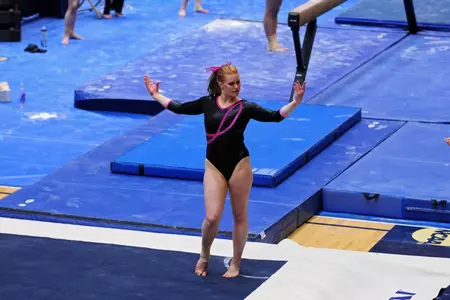 Junior Leslie Delima records a season-high 38.950 all-around