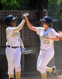 Autumn Taylor high-fived Katie Terrazas after she scored in the first game.
