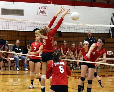 Jamie Armstrong blocks an attack last year for her Monroe H.S. team in Wisconsin.