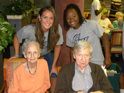 Junior Sara Mostafa and the GW women's basketball team visited and played Bingo with the residents of nearby St. Mary's Court Aug. 6.
