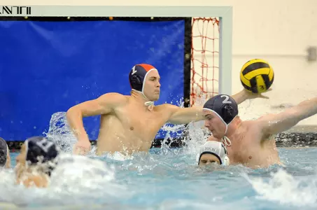Cameron Illes makes one of his 13 saves in GW's 10-7 victory over Bucknell in CWPA Southern Division action at Smith Center Saturday.