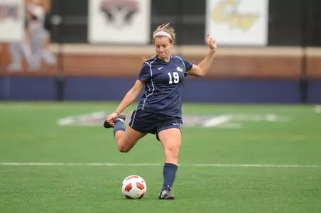 Junior Molly Bruh ready for a free kick against Massachusetts.