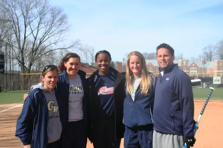Senior Katie Terrazas and freshman Courtney Martin posed with Olympian Natasha Watley at Mount Vernon Field.