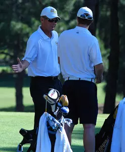 Coach Terry Shaffer and Brendan Barrack during second-rd. action at the A-10 Golf Championship.
