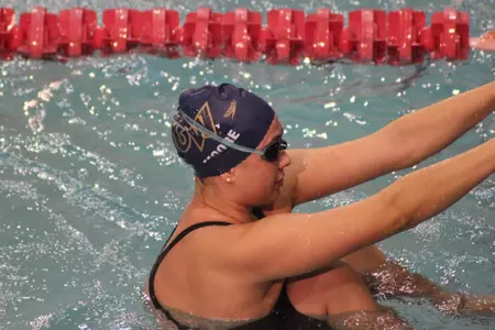 Junior Lindsay Moore earned a third-place finish in the 100-yard backstroke against Towson on Saturday.