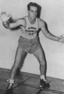 GW men's basketball alumnus Red Auerbach represents the Colonials on the inaugural Atlantic 10 Men's Basketball Legends to be honored at the 2013 A-10 Championship.