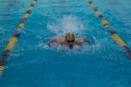 Junior Goran Koprivnjak owns the top times in the A-10 in the 100 and 200 fly events.