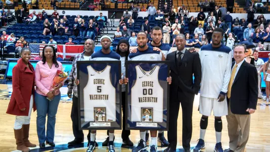 Seniors Bryan Bynes and Dwayne Smith played crucial roles in Saturday's thrilling 81-80 overtime victory over Dayton that clinched an A-10 Championship bid for GW.