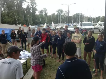 GW sailing alumnae and ICSA Hall of Famer Skye Kussman '13 directs the group at Saturday's inaugural Alumni Regatta.