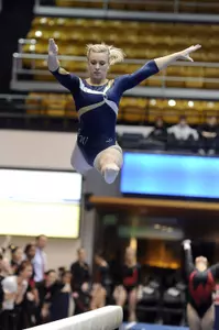 Graduate student co-captain Kayla Carto won the all-around to lead the GW gymnastics team to a first-place finish at the Lindsey Ferris Invitational.