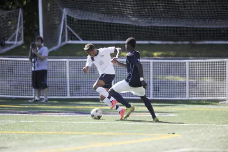 Freshman Oliver Curry assisted on both of GW's goals last weekend.
