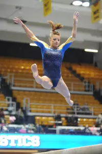 Senior Betsy Zander tied for first on balance beam on Friday night.