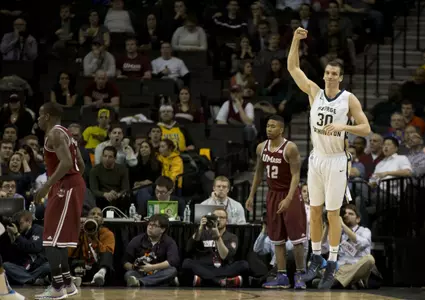 Senior Nemanja Mikic provided a huge spark off the bench with three first-half 3-pointers en route to 14 points in Friday's 85-77 quarterfinal win over UMass.