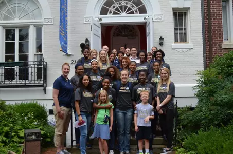 The travel party with Dr. Beck on the steps of the French Alliance.