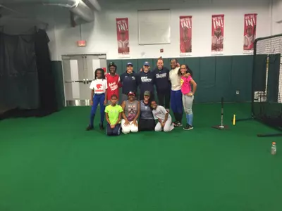 The softball team volunteered at the Nationals Youth Academy, just a fraction of the 4,800 community service hours logged by GW student-athletes in the fall semester.