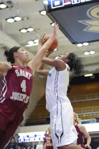 Junior Caira Washington scored 19 points on 9-of-12 shooting and added nine rebounds against Hartford.