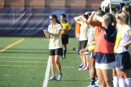 Head Coach Sarah Barnes and her staff will provide hands-on instruction during July's overnight soccer camp.