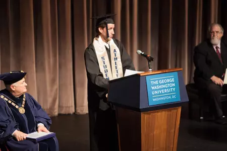 Matthew Coughlin addresses the audience and his classmates at the Athletics Commencement Ceremony on Tuesday.