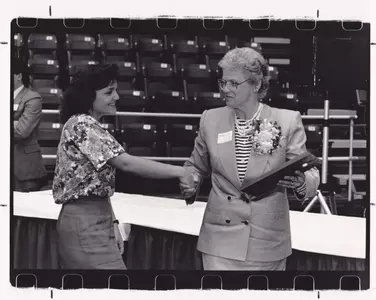 <center><i>Lynn George (right)</i></center>