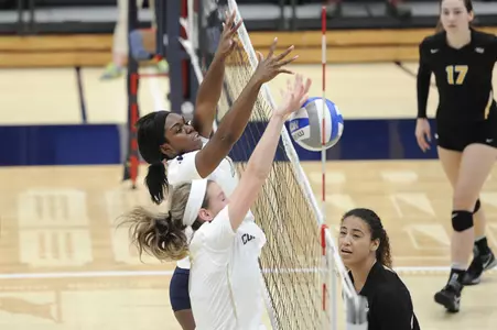 Women's Volleyball Blocking over the net