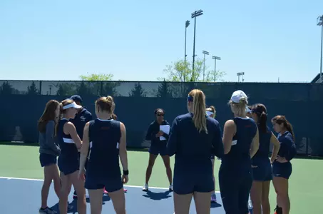 Women's Tennis huddle