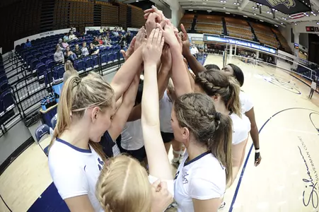 Women's volleyball huddle