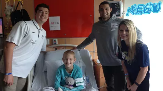 Zach Slaughter, Pierce Deamer and Rochelle Draper visited Inova Children's Hospital on Nov. 12.