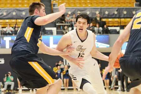 Men's Basketball Action Shot