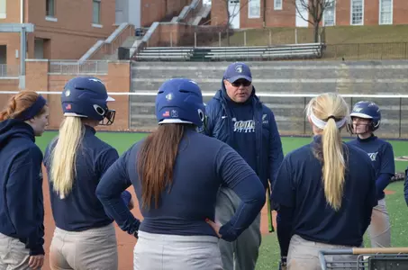 Head Coach James DeFeo directs his Colonials at Tuesday's season-opening practice.