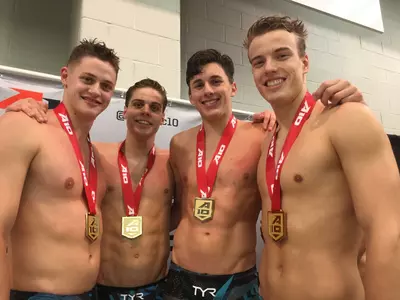 Tommi Wolst, Gustav Hokfelt, Alex Auster and Emils Pone (left to right) claimed gold Wednesday at the A-10 Championships.