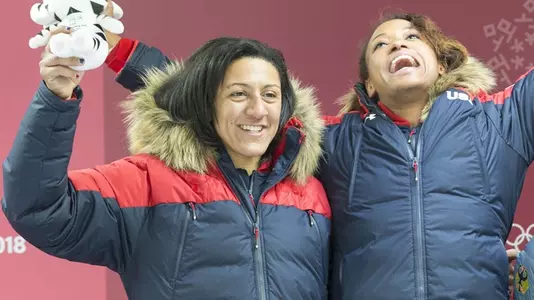Elana Meyers Taylor (left) earned her third Olympic bobsled medal Wednesday. (Photo courtesy IBSF)