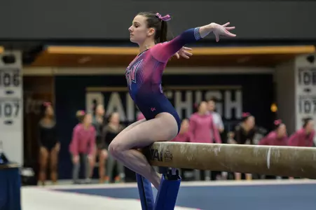 Cami Drouin-Allaire posted a season-high 9.875 on beam en route to a career-high 39.525 in the all-around.