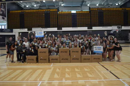 GW student-athletes and staff members came together Friday to stuff 500 Joy Jars.