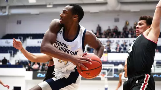 Maceo Jack drives the lane against Davidson