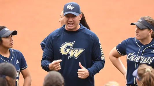 Head Coach Shane Winkler talks with his team.
