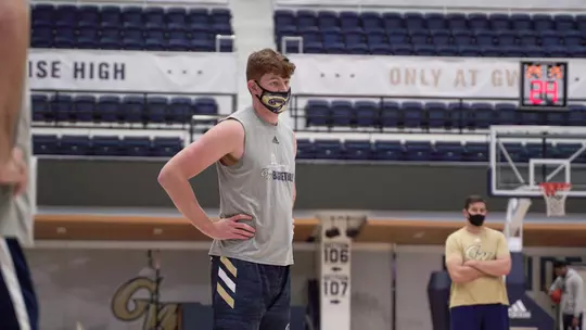 Sloan Seymour looks on at practice.