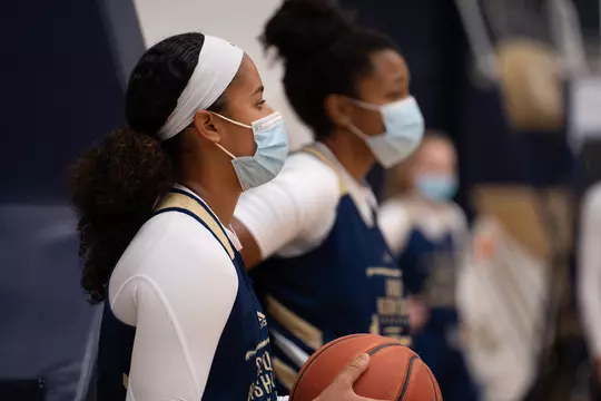 Jasmine Whitney looks on at practice.