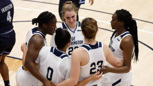 Women's basketball huddles