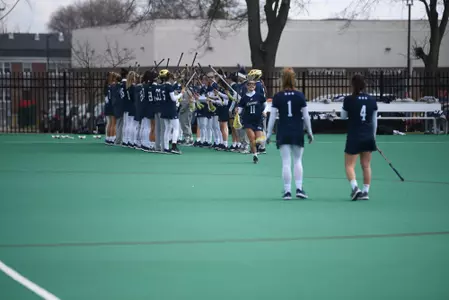 Caroline Esmond runs onto the field.