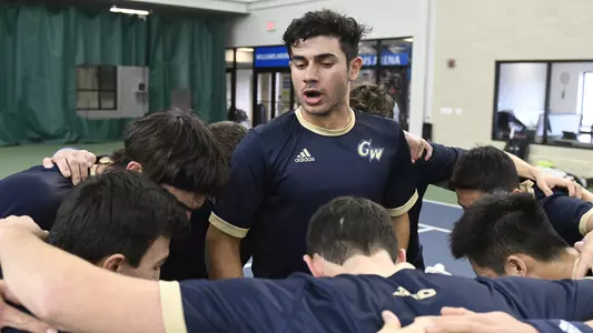 Lawrence Sciglitano pumps up his teammates before a match.