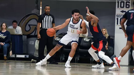 Arnaldo Toro posts up a Duquesne defender