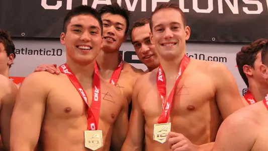 Men's Swimmers Moritz Fath, Haoning Chen, Youssef Ragab and Tyler Kawakami pose with their medals
