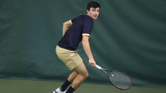Ryan Navarro prepares for a backhand shot.
