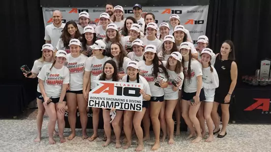 GW women's swimming and diving celebrates its championship.