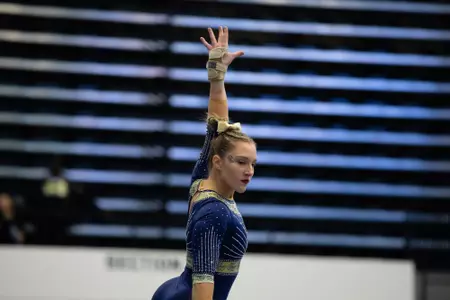 Simone Banen competes on balance beam.