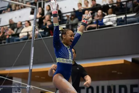 Deja Chambliss all smiles after bars routine
