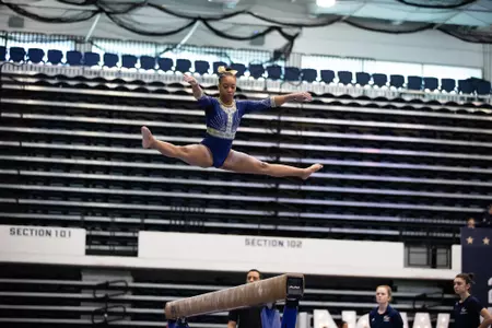 Deja Chambliss competes on balance beam.