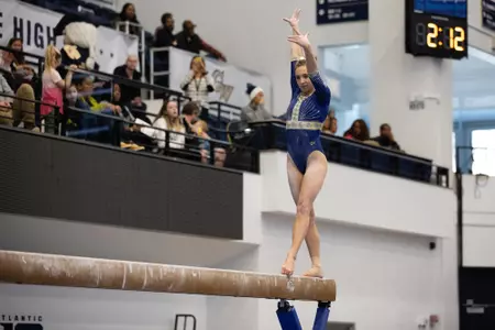 Olivia Zona competes on balance beam