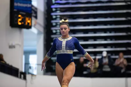 Cydney Crasa competes on beam.