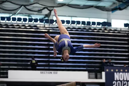 Hannah Cohen competes on balance beam.